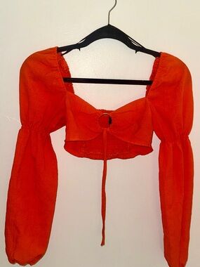 Orange Bandeau Long Sleeve Top Silver Ring Cutout Detail.